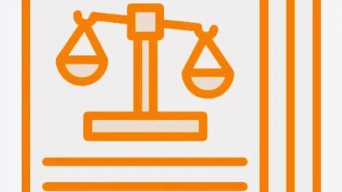 Deux collaborateurs examinent ensemble un document dans le cadre d'une analyse AIPD intelligence artificielle